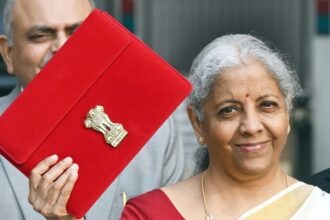 Union Finance Minister Nirmala Sitharaman with other officials outside the Finance Ministry ahead of the Budget 2025 presentation